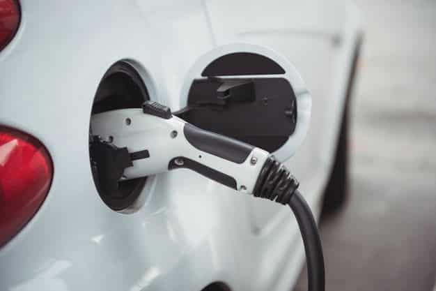 close-up-car-being-charged-with-electric-car-charger_107420-94908